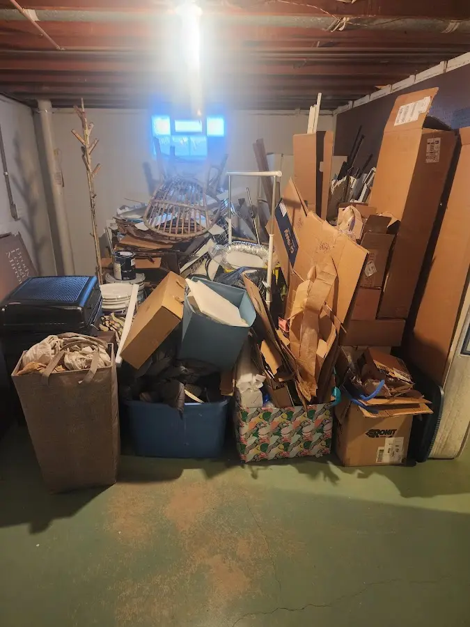 Roll-off dumpster container at job site for 20 Yard Dumpster Rental in Ayer